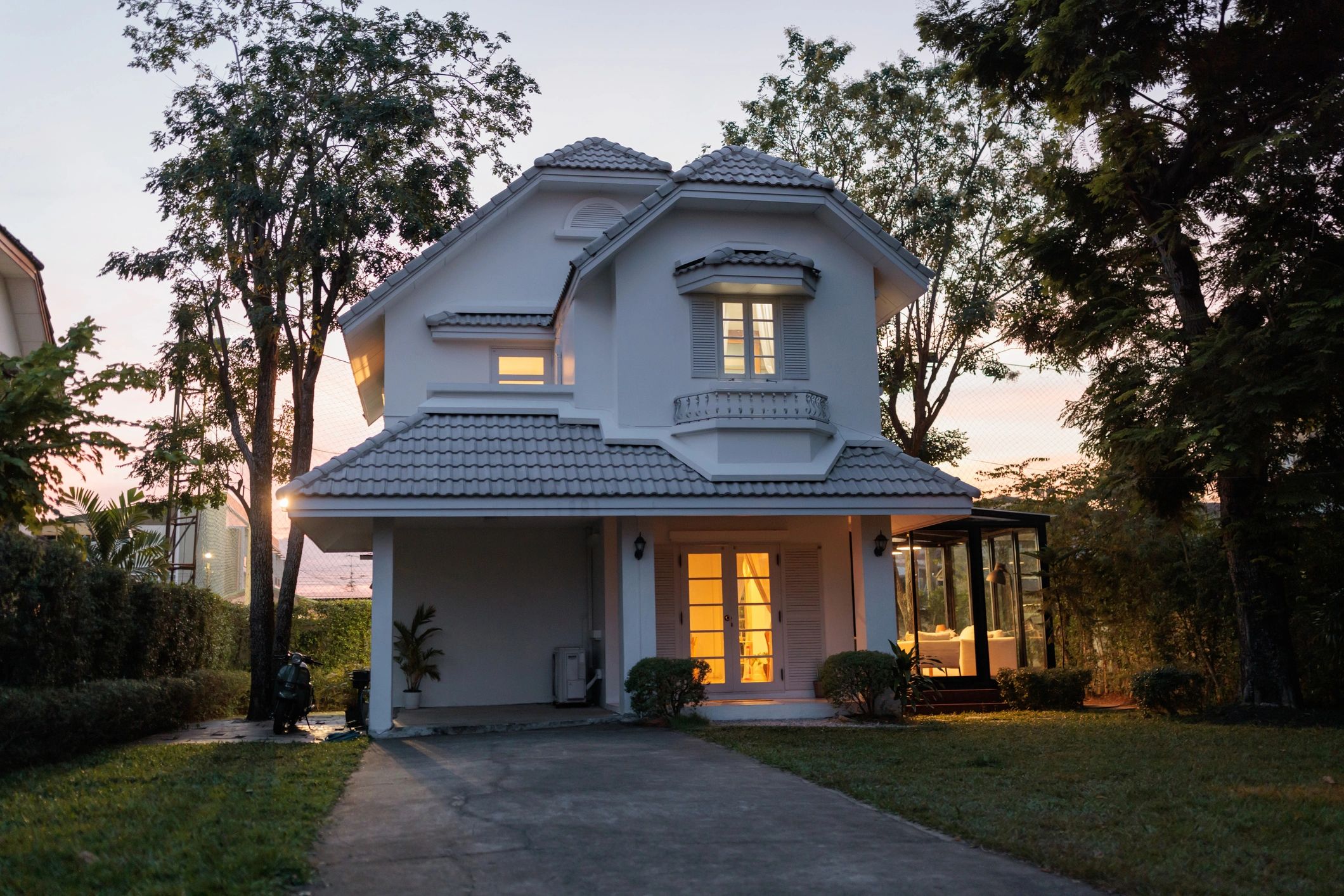 Charming vintage bungalow exterior at dusk