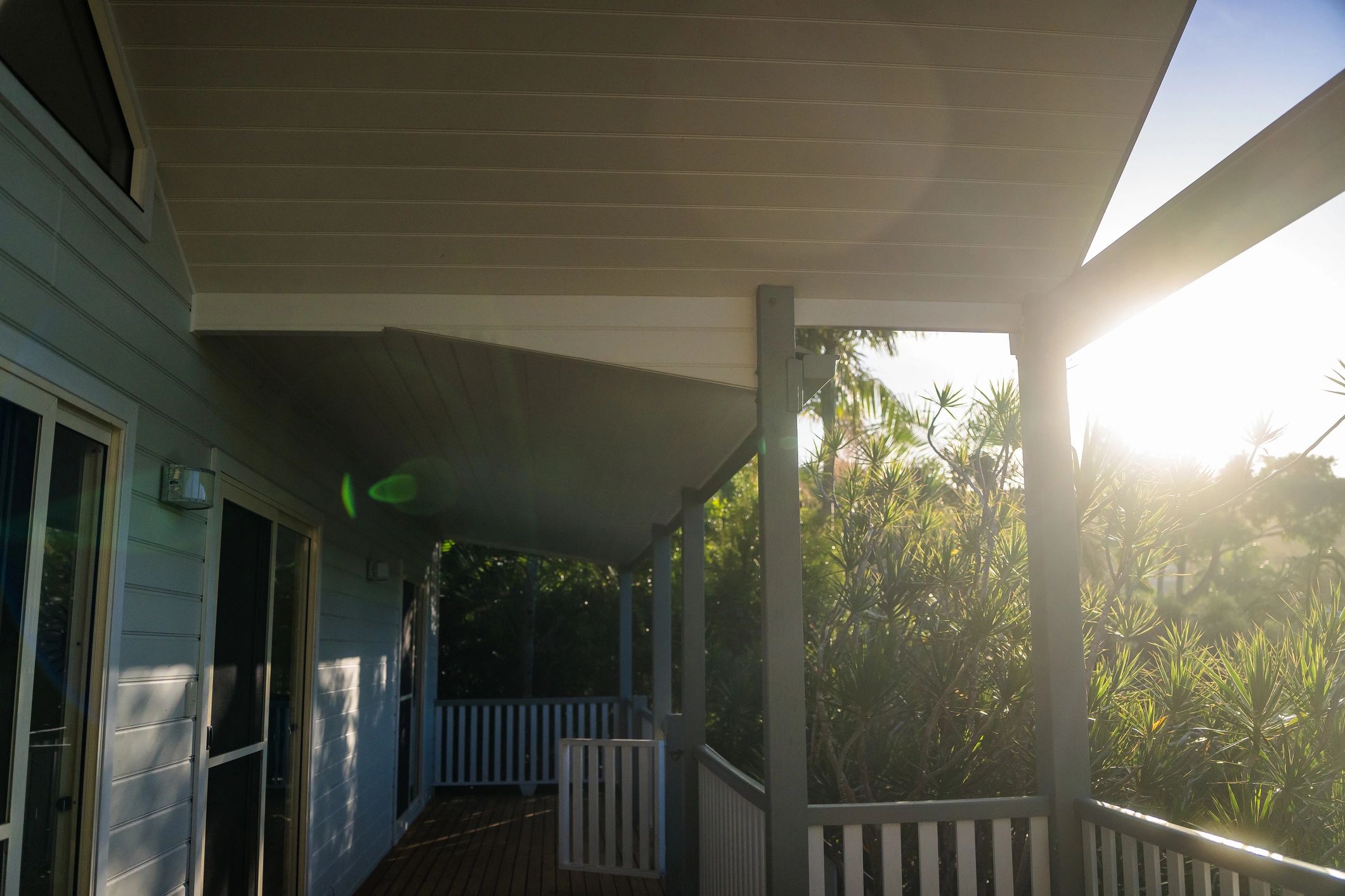 Covered front porch of a character-filled historic home